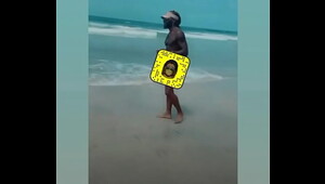 Black booty squirting at beach