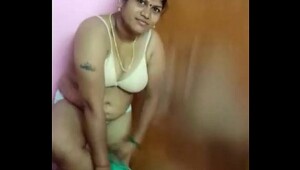 Indian aunty removing her bra