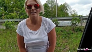 German marture milf gives blowjob outdoor in car