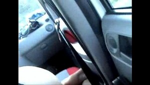 Real amateur college guy gives guy a blowjob in a car