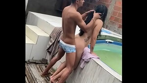 Girl have porn with guy in th pool