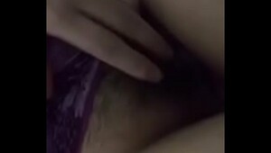 Indian teenage girl with big tits fingers herself for lover