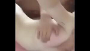 Asian couple enjoy sex in the bedroom