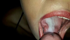 Sucking and son discharging on her mouth