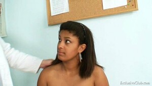 Black doctor breast exam with stethoscope