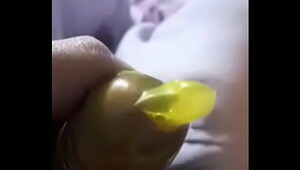 Masturbating with a condom on