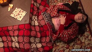 Nerdy asian teen rubs her cunt under the blanket