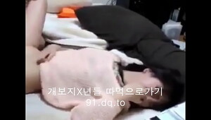 Korean mom and son while dad is asleep